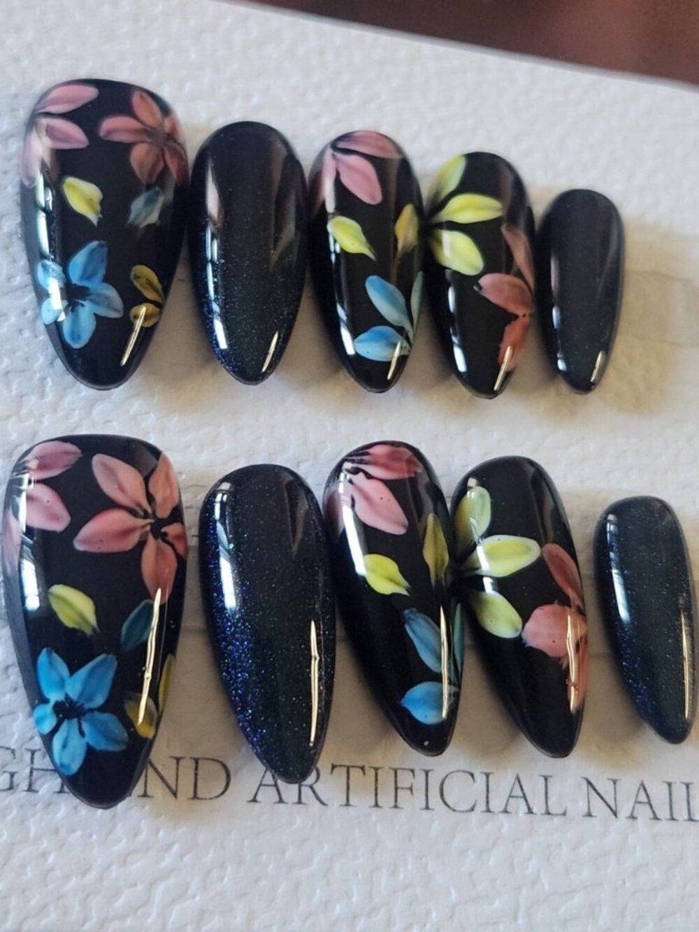 Black & multi-color floral almond press-on nails w dark blue cat-eye. 2.5. Small